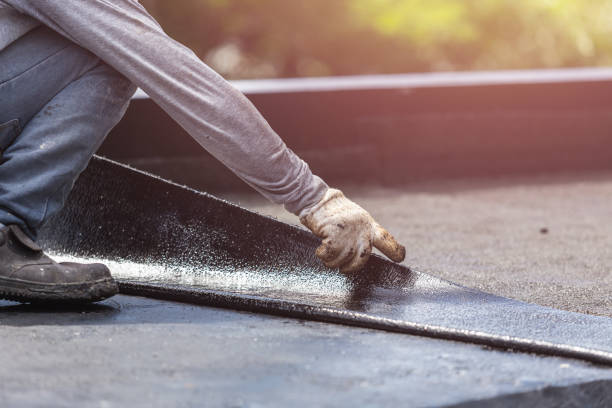Professional Emergency Waterproofing technician working in Columbus, KS